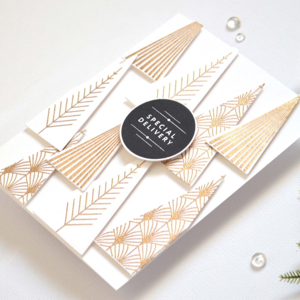 Modern Christmas tree card featuring layered triangle dies for a sleek modern look