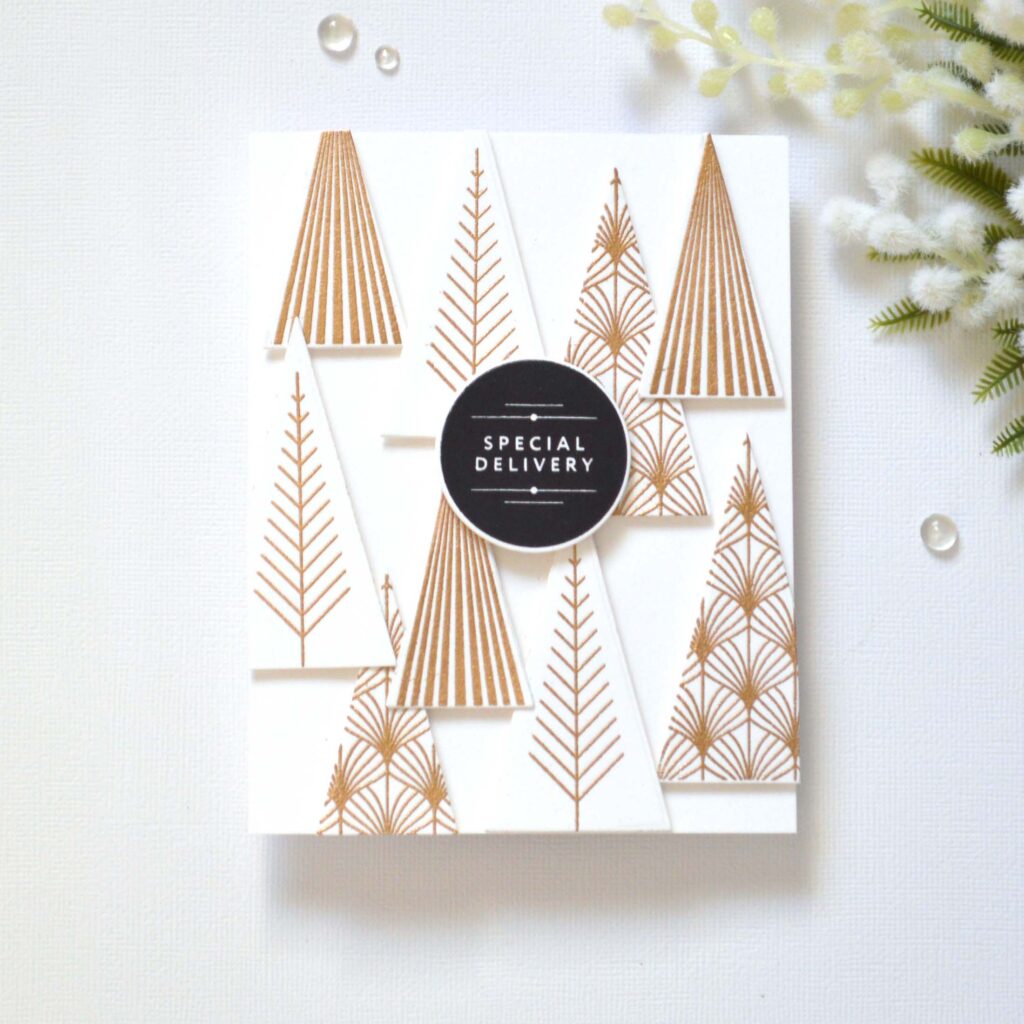 Modern Christmas tree card featuring layered triangle dies for a sleek modern look