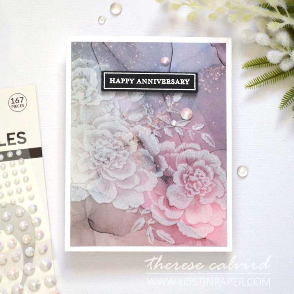 Textured card background created with embossing folder on design paper and enhanced with white pigment ink