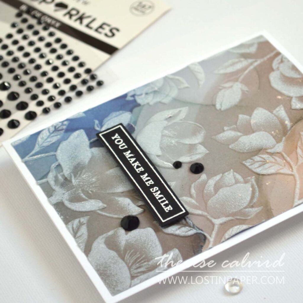 Textured card background created with embossing folder on design paper and enhanced with white pigment ink