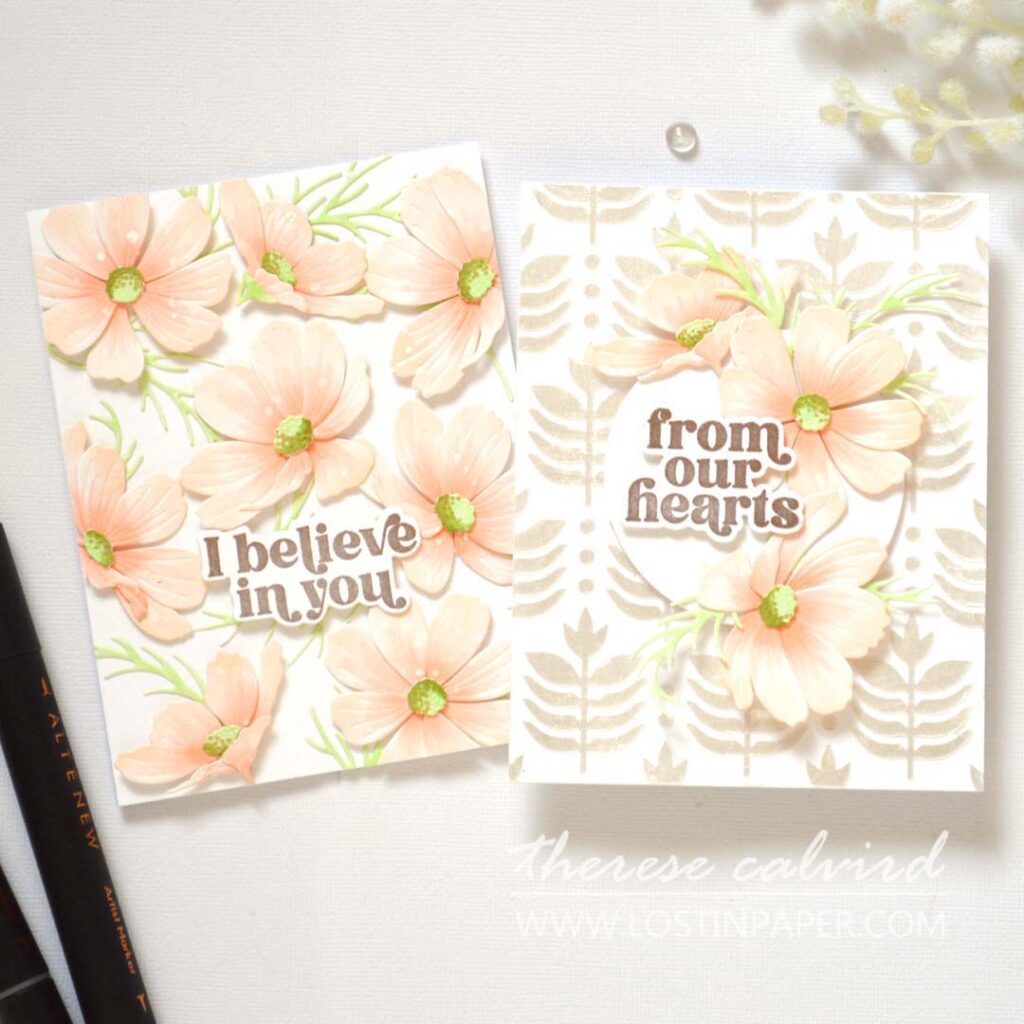 Two handmade cards showing Cosmos layering flowers: one with a full floral background and one with a focal point on a textured background