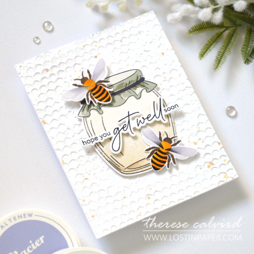 Handmade focal point card featuring a jar of honey, two bees, and a 3D embossed background with sentiment across the center