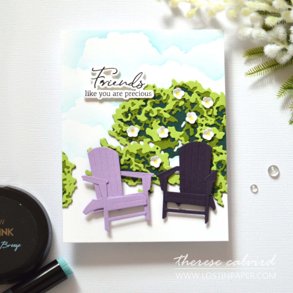 Summer floral bush card with two chairs and stencil cloud background by Therese Calvird