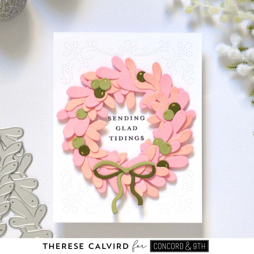 Holiday card featuring a die cut wreath in nectar and pink tones with a coordinating sentiment