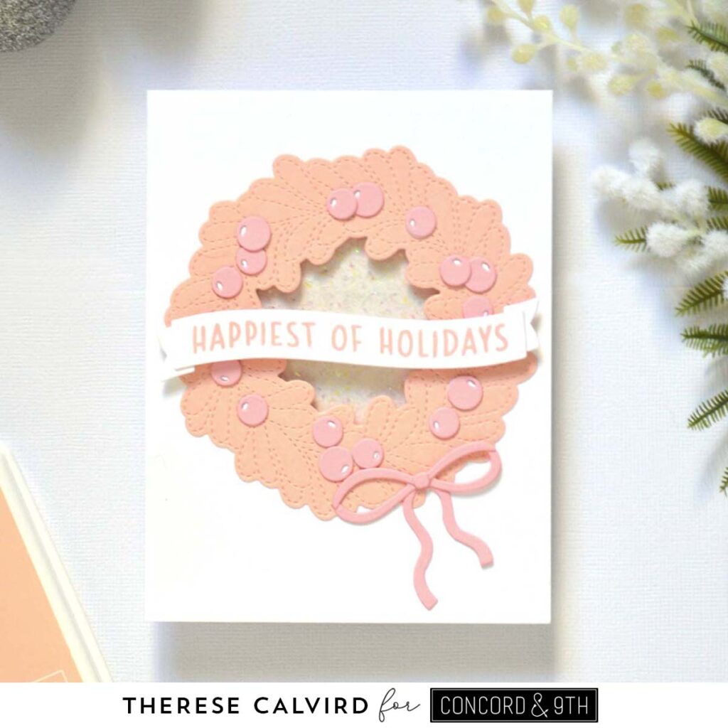 Holiday card featuring a die cut wreath in nectar and pink tones with a coordinating sentiment
