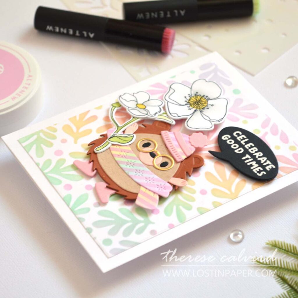 Whimsical rainbow hedgehog greeting card with rainbow stenciled background using three stencil techniques by Therese Calvird