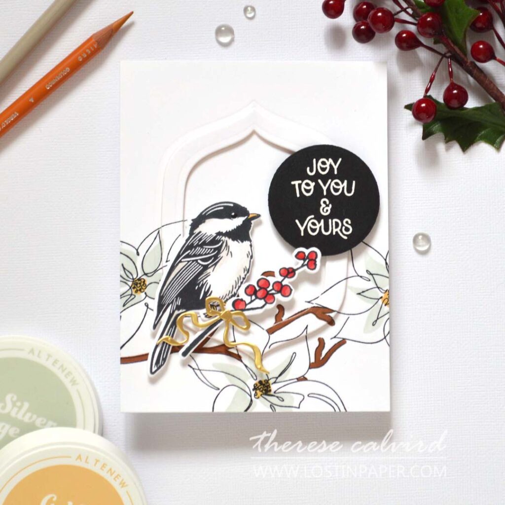 Eclipse technique bird Christmas card with hidden die-cut frame and festive floral branch – designed by Therese Calvird.