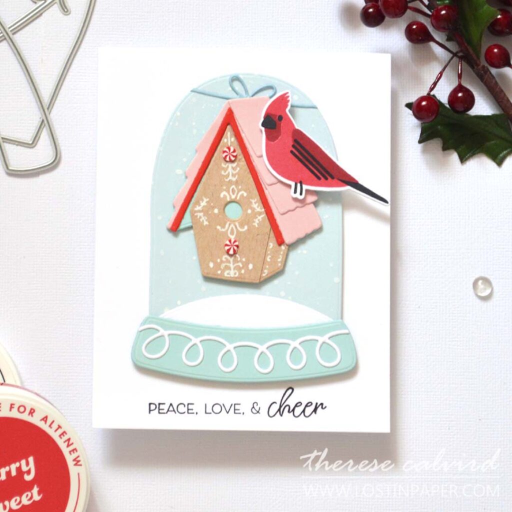Clean and simple layered stamped bird card featuring a gingerbread-style birdhouse hung from a snow globe with a cardinal perched on the roof by Therese Calvird