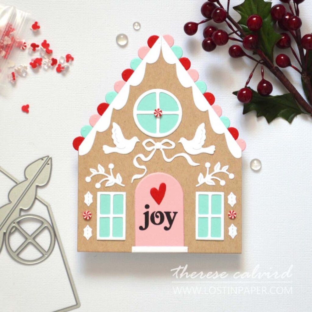 Gingerbread house shaped card decorated with die cuts created by Therese Calvird