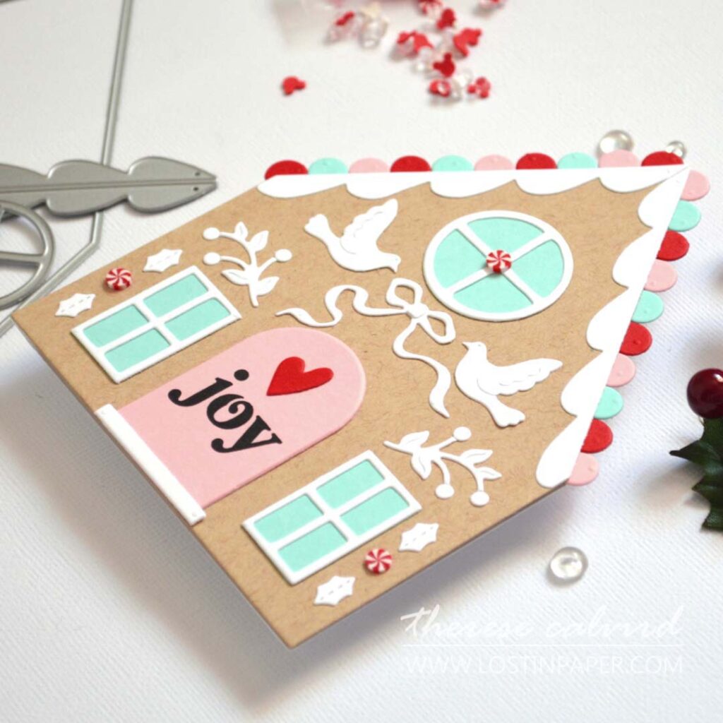 Gingerbread house shaped card decorated with die cuts created by Therese Calvird