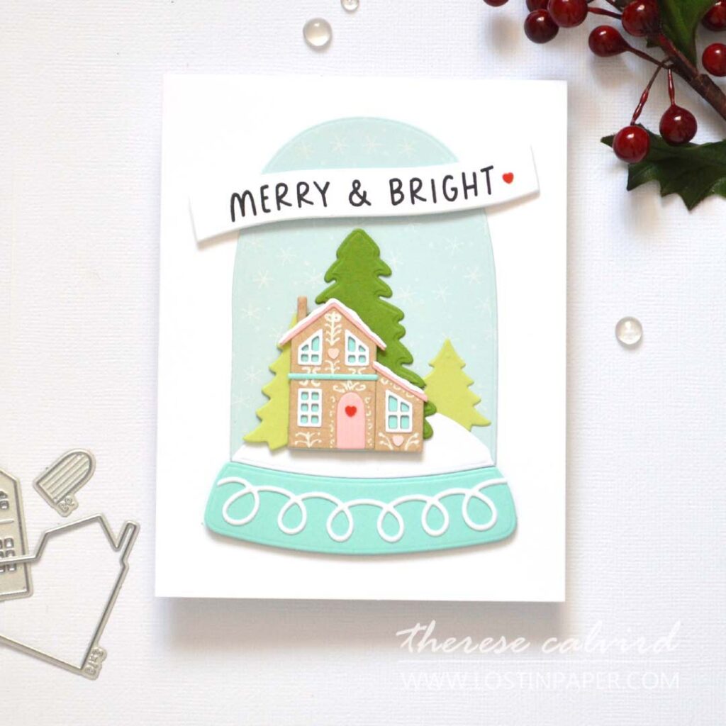 Small hand decorated gingerbread house in a die cut snow globe with doodled details by Therese Calvird
