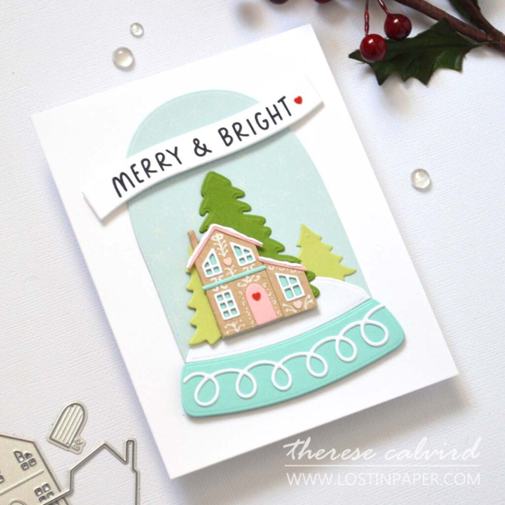Small hand decorated gingerbread house in a die cut snow globe with doodled details by Therese Calvird