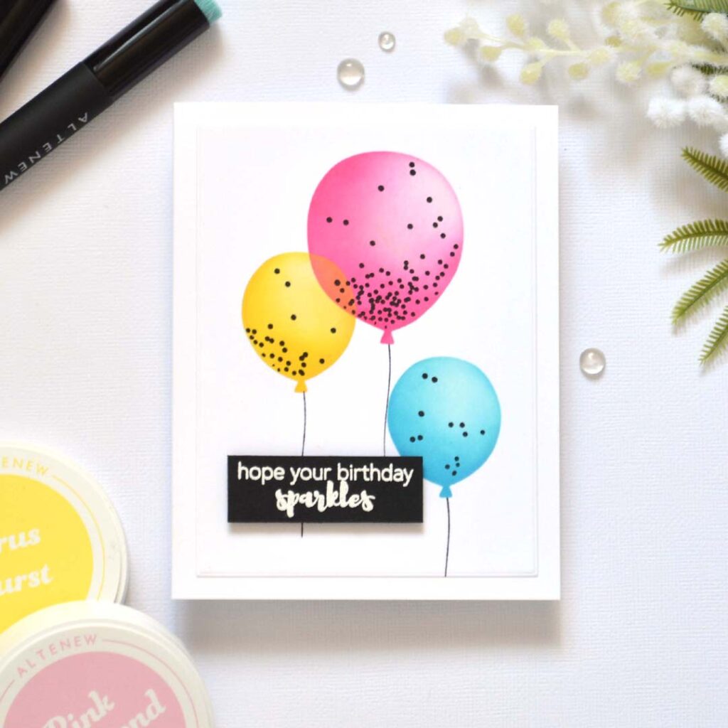 Stencil card ideas – Confetti Balloon Twist card by Therese Calvird