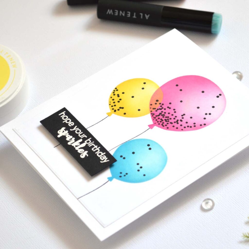 Stencil card ideas – Confetti Balloon Twist card by Therese Calvird
