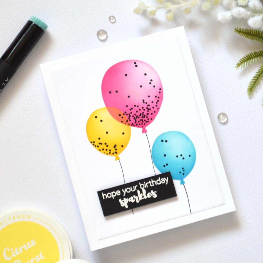 Stencil card ideas – Confetti Balloon Twist card by Therese Calvird