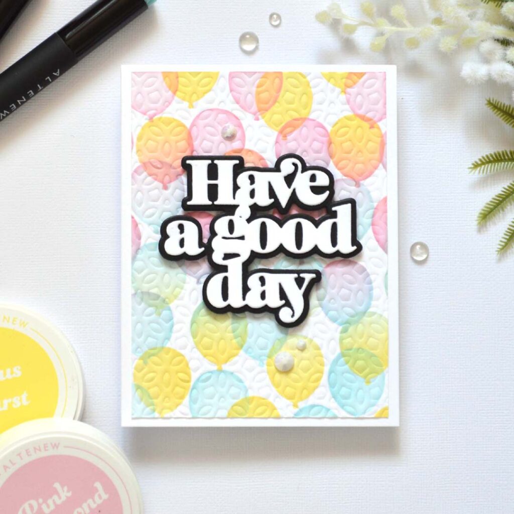 Stencil card ideas – Textured Rainbow Balloons card by Therese Calvird