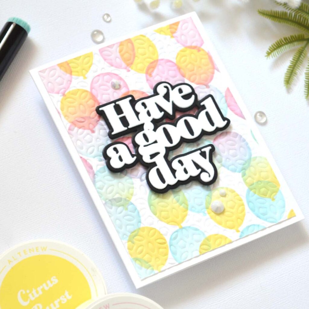 Stencil card ideas – Textured Rainbow Balloons card by Therese Calvird