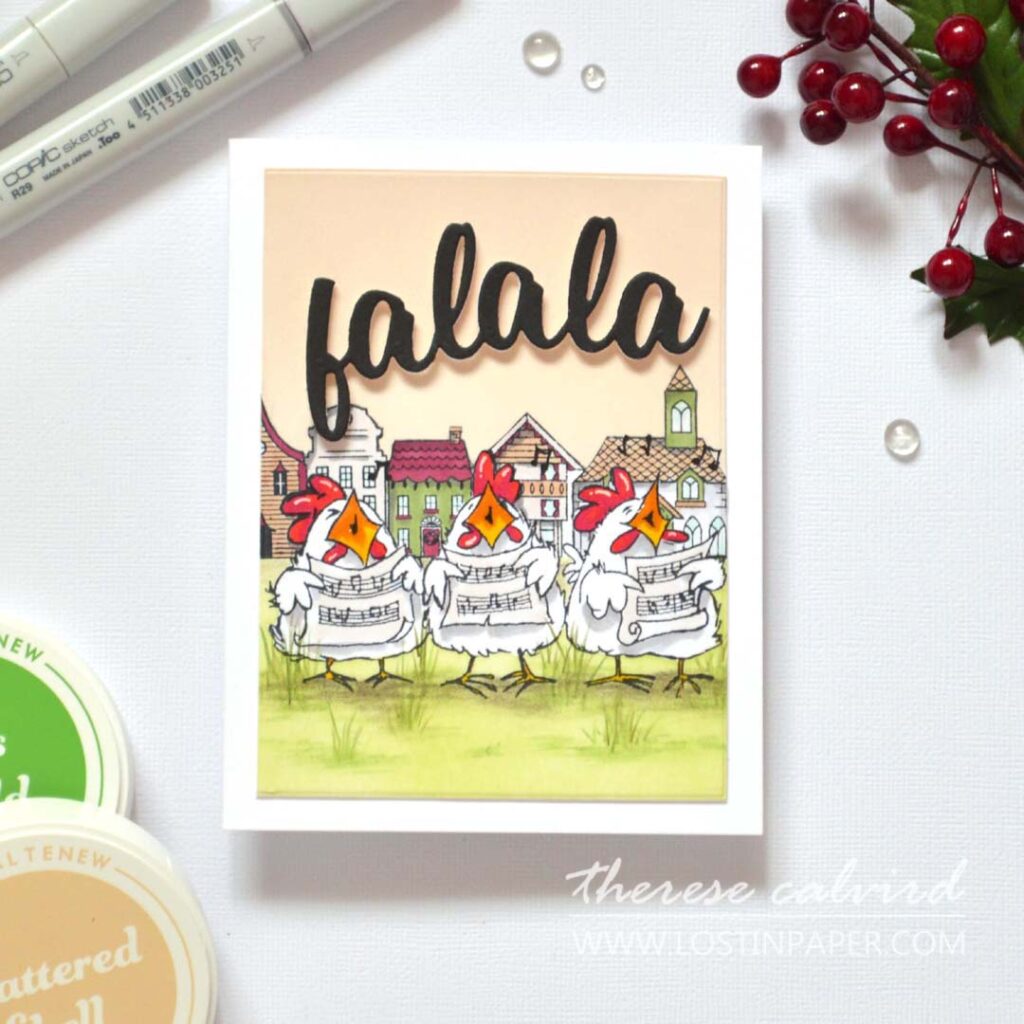 Three caroling chickens in a stamped street scene; alcohol markers, ink-blended sky and ground, pencil grass details, shiny beaks, gel-pen highlights, and a bold popped-up “fa la la.”