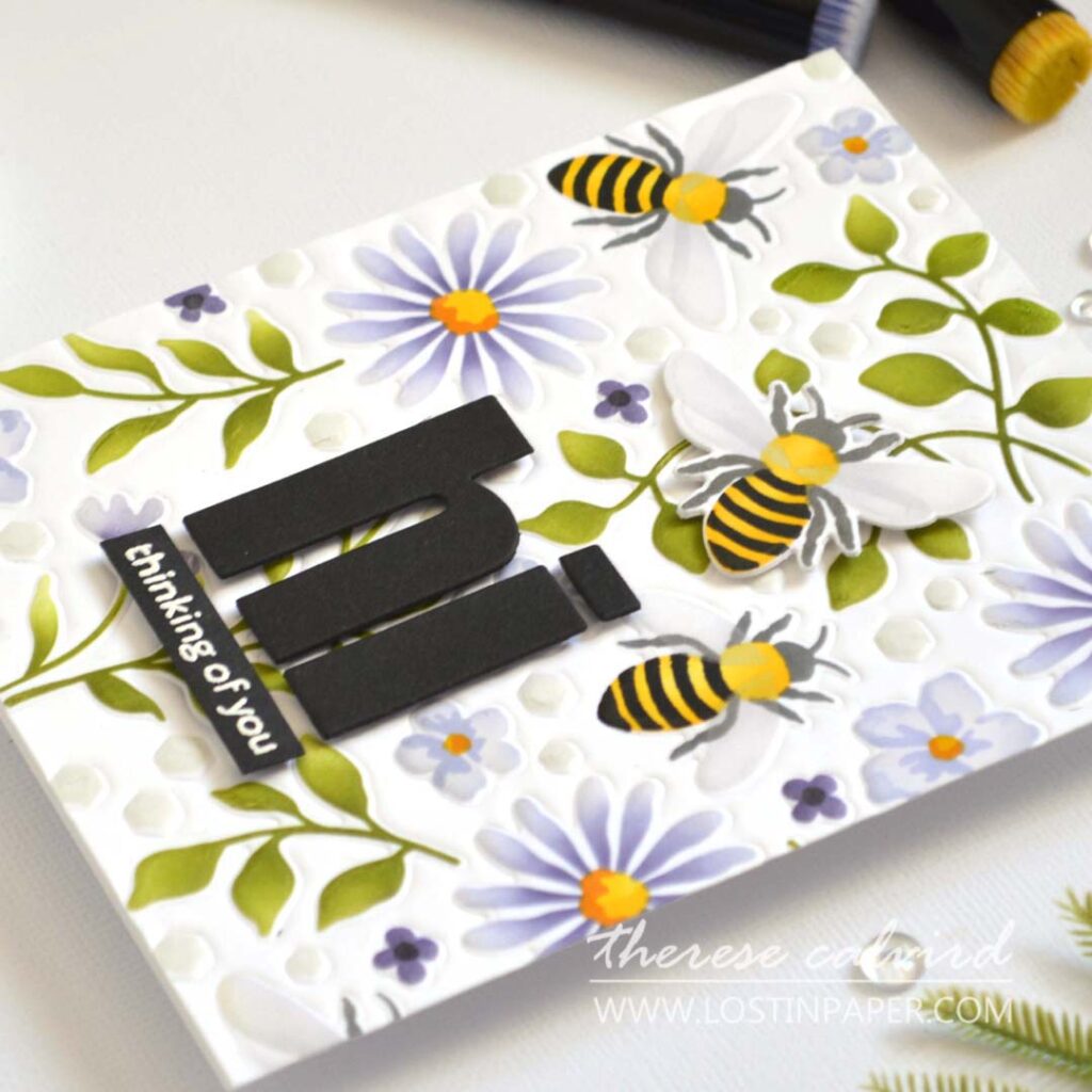 Handmade floral and bee card with ink-blended stencil background, featuring die-impressed texture for added dimension without bulk.