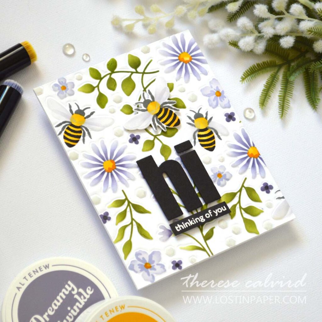 Handmade floral and bee card with ink-blended stencil background, featuring die-impressed texture for added dimension without bulk.