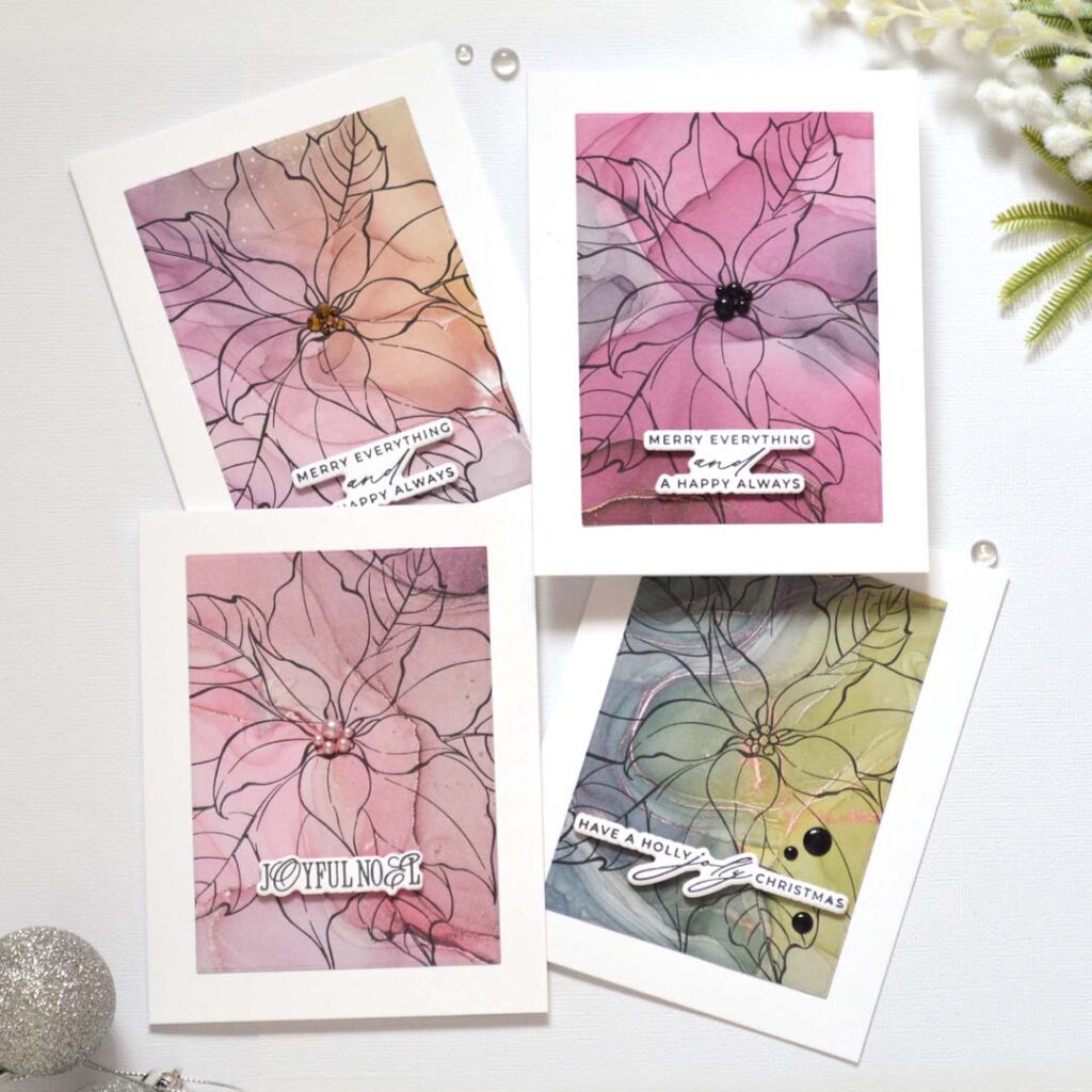 Group of handmade holiday cards from the Same But Different Christmas series by Therese Calvird featuring outline stamped poinsettias on patterned paper with pearl accents.