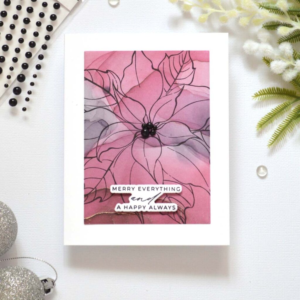 Handmade holiday card from the Same But Different Christmas series by Therese Calvird featuring a large black outline poinsettia stamped on patterned paper with pearl details.