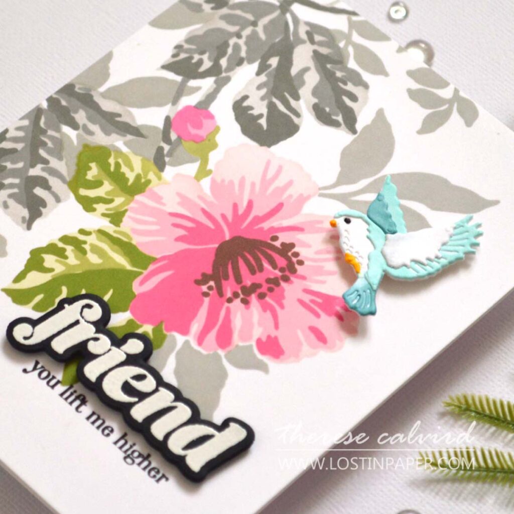 Floral card with a blue bird focal point, Therese Calvird.