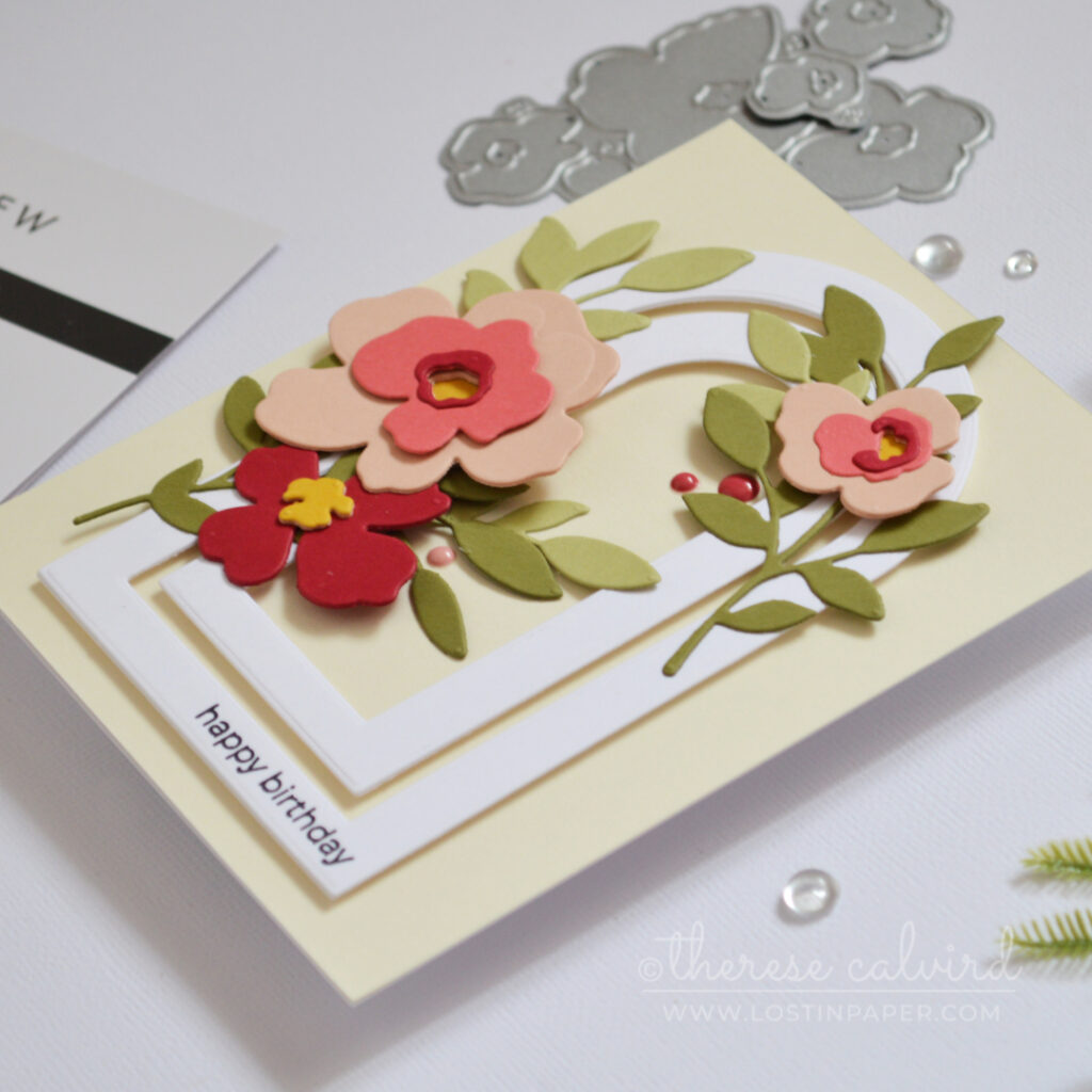 Handmade card with layered nesting arch frames and modern floral die cuts with sentiment on the frame by Therese Calvird