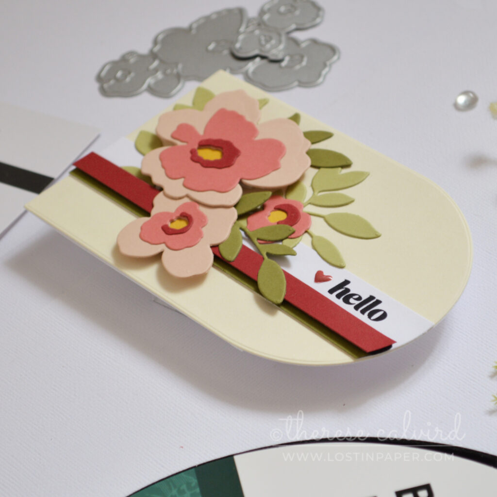 Landscape shaped handmade card using a nesting arch die with modern stripes and floral bouquet by Therese Calvird