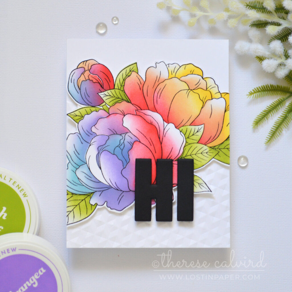 Rainbow ink blended floral bouquet card with a fussy cut floral focal point and angled embossed background by Therese Calvird
