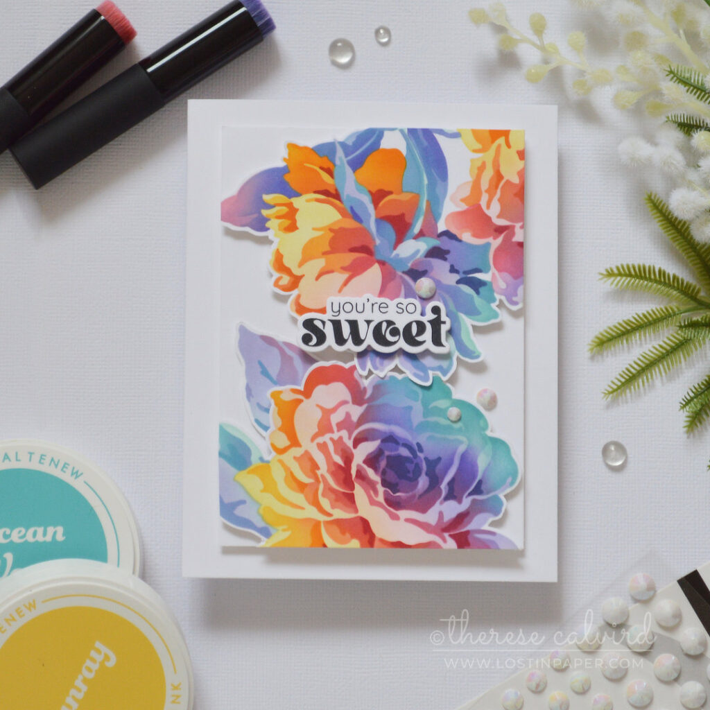 Rainbow ink blended floral card with layered stencil blooms fussy cut and popped up on a clean card design by Therese Calvird