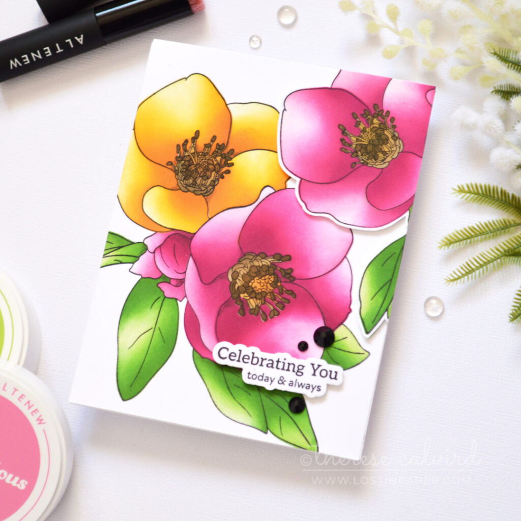 Bright floral card with three large blooms colored using layering stencils by Therese Calvird
