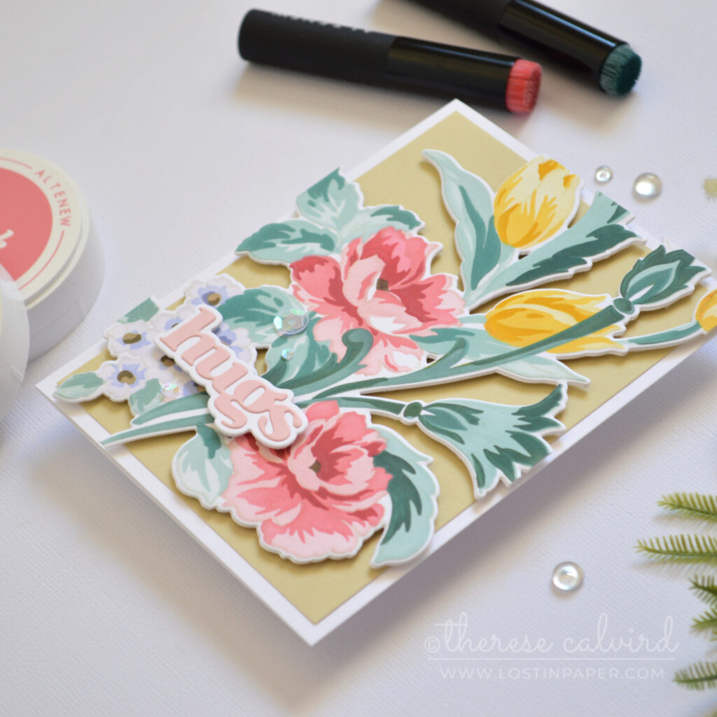 Flourished Flora no line stencil die cut floral card with misty moor background and pink hugs sentiment by Therese Calvird