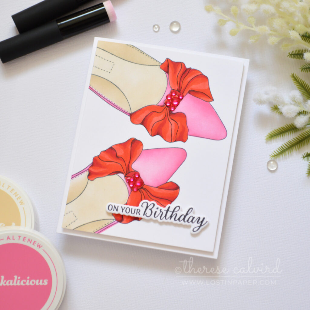 Ink Blended Shoe Card with pink shoes and red bow colored with markers by Therese Calvird
