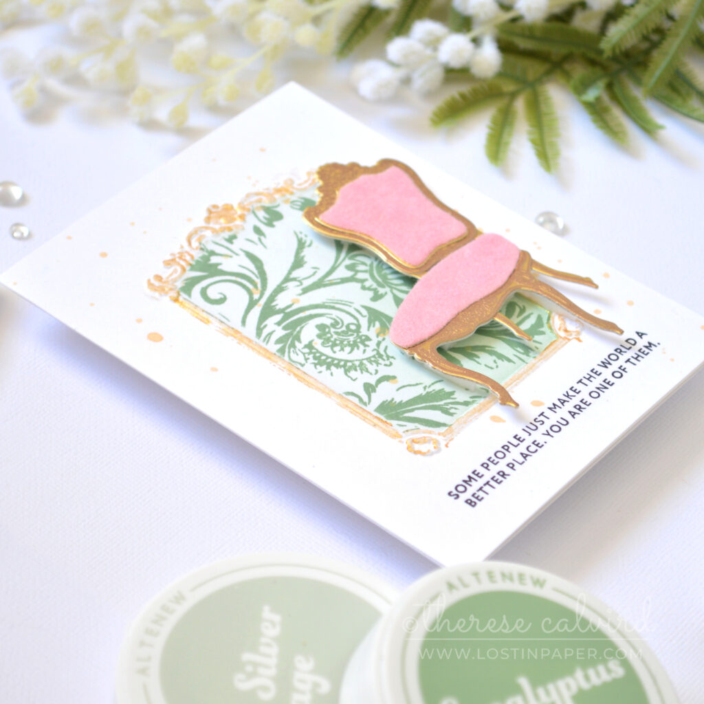 Elegant textured cardmaking ideas with gold frame and wallpaper background featuring flocked chairs by Therese Calvird