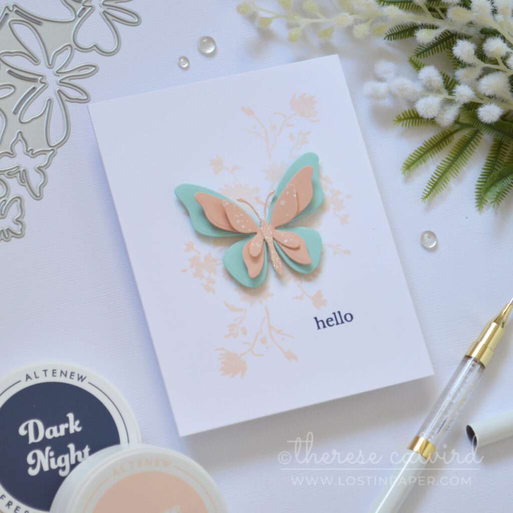 Clean and simple butterfly card with single die cut butterfly and pastel florals by Therese Calvird