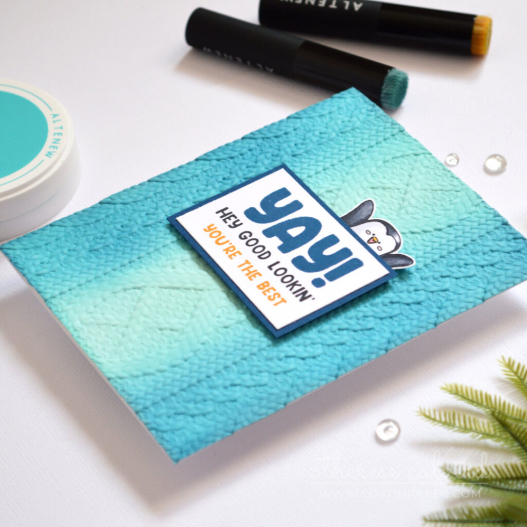 Masculine embossed sweater texture card with centre ombre blending and layered sentiment with penguin Therese Calvird