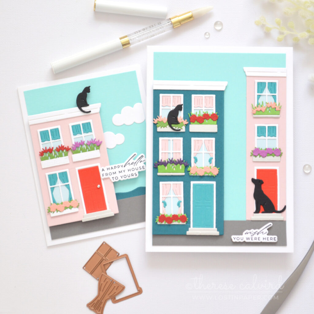 Two Everyday City Holiday handmade cards featuring layered die cut houses with shaped windows, flower boxes, cat and dog details by Therese Calvird