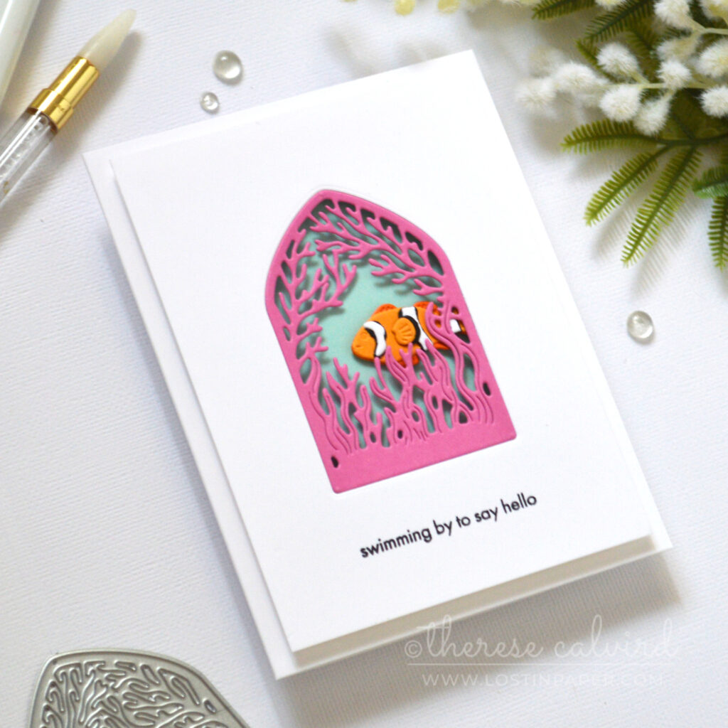 Clean and simple coral reef open scene card with arched coral frame and bright orange fish by Therese Calvird