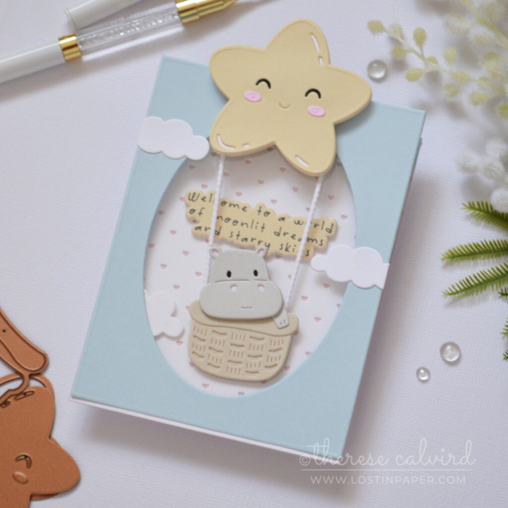 Interactive baby boy window easel card with swinging baby basket by Therese Calvird