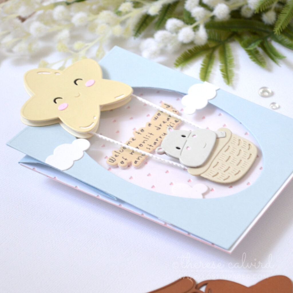 Interactive baby boy window easel card with swinging baby basket by Therese Calvird