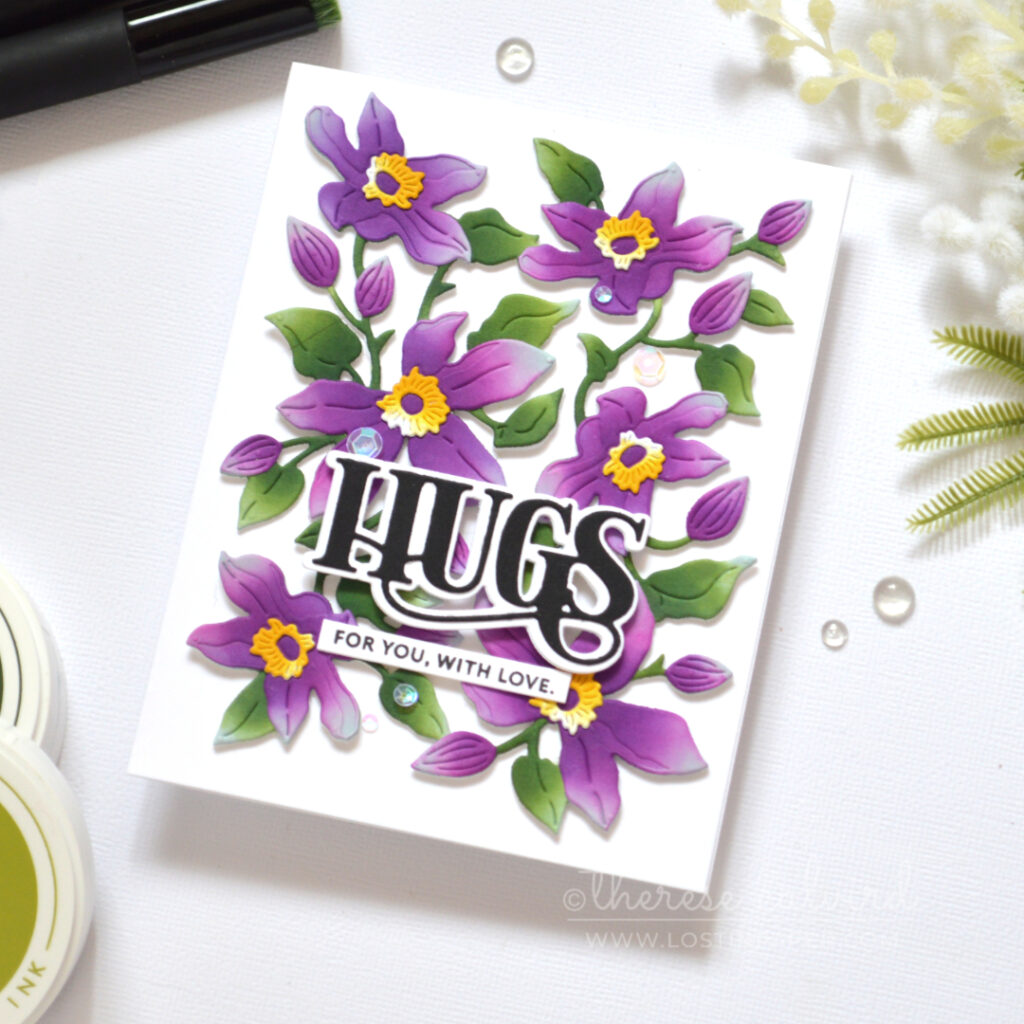 Ink blended floral card created with a Clematis die set by Therese Calvird