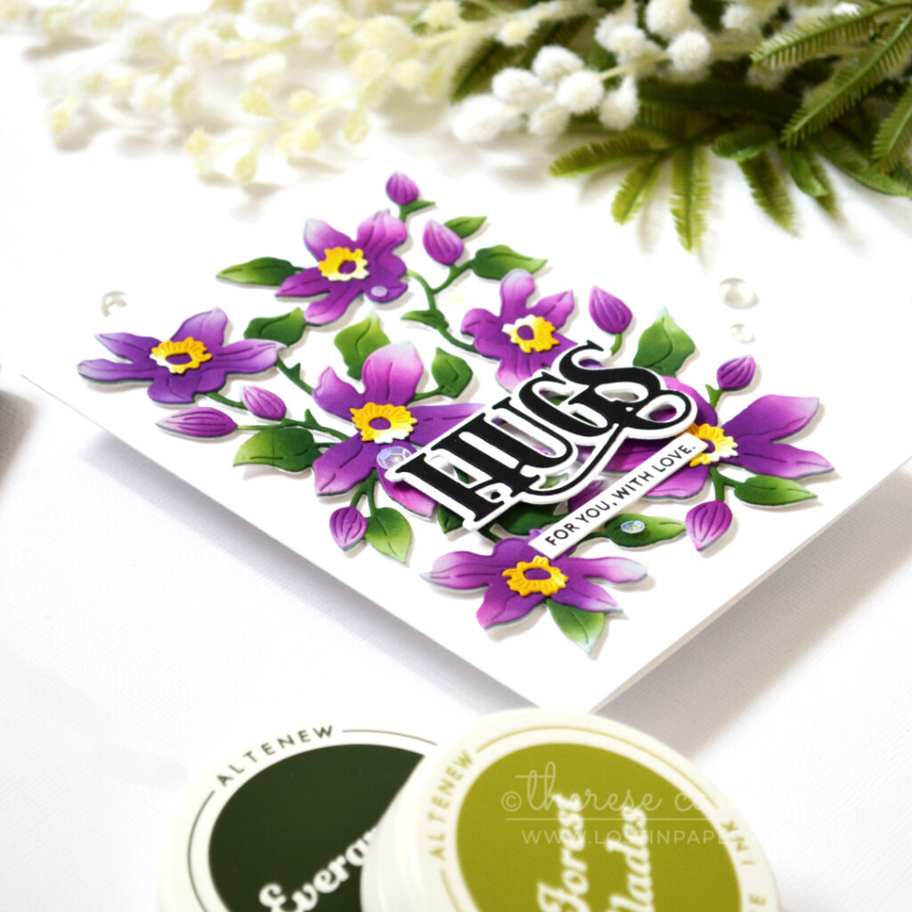 Ink blended floral card created with a Clematis die set by Therese Calvird