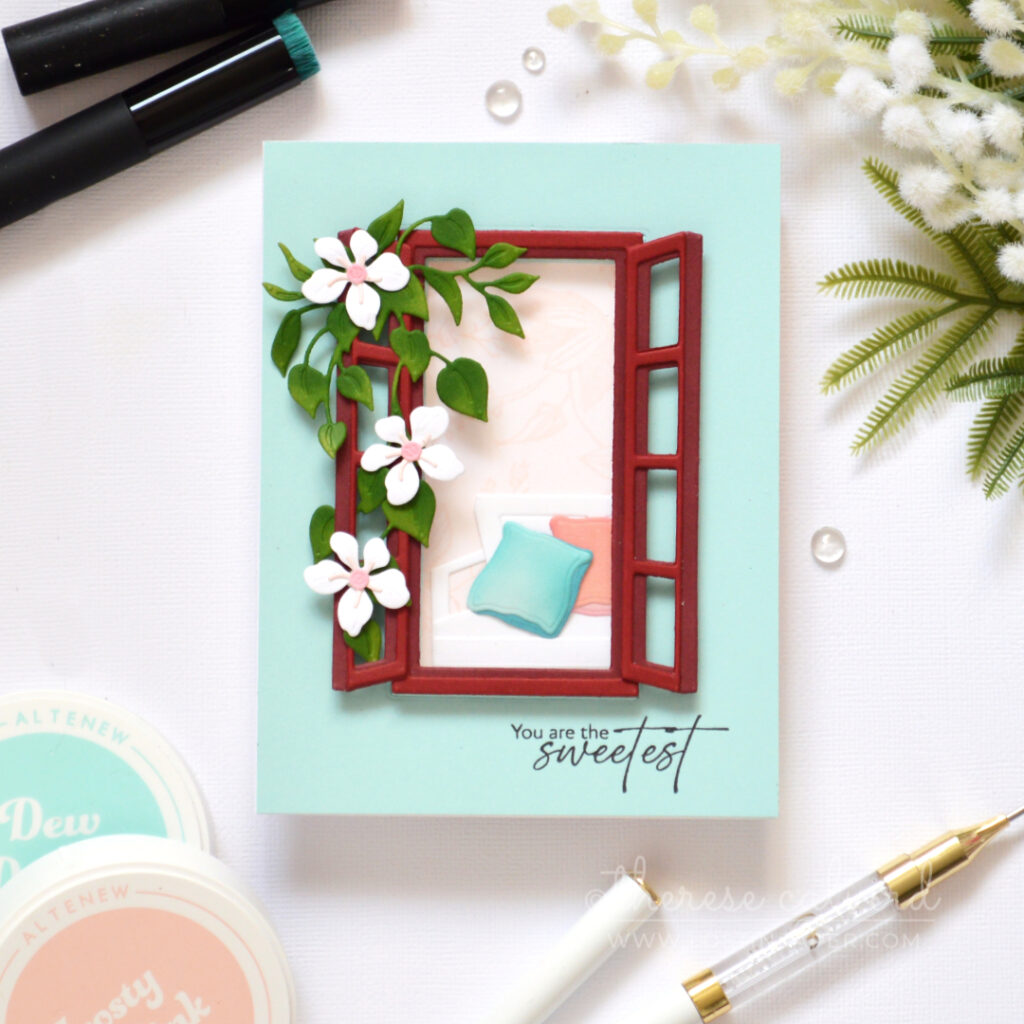 Handmade trifold card with a red acetate window, floral vine, soft wallpaper background, and a seat created from altered window frame dies.