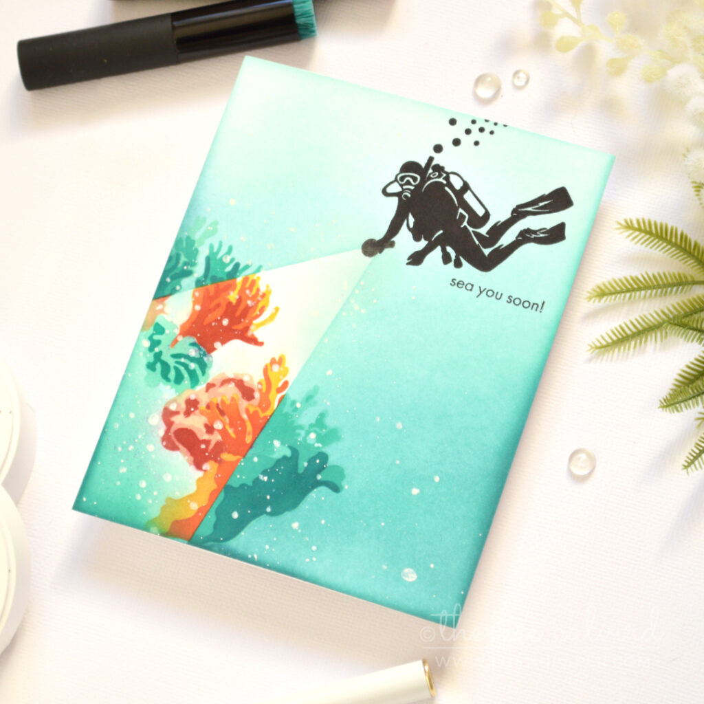 Spotlight reef card by Therese Calvird with embossed coral background and ink blended circle