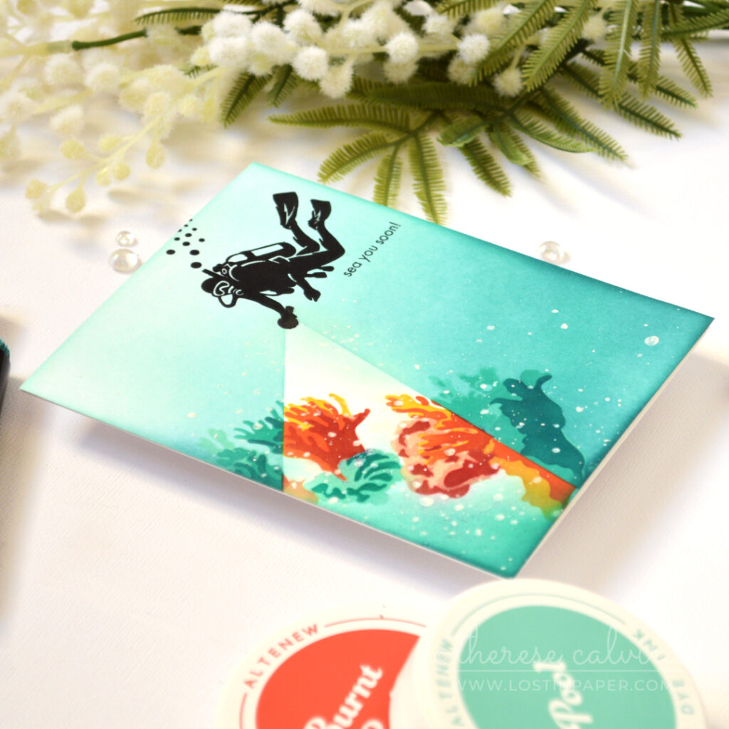 Spotlight reef card by Therese Calvird with embossed coral background and ink blended circle