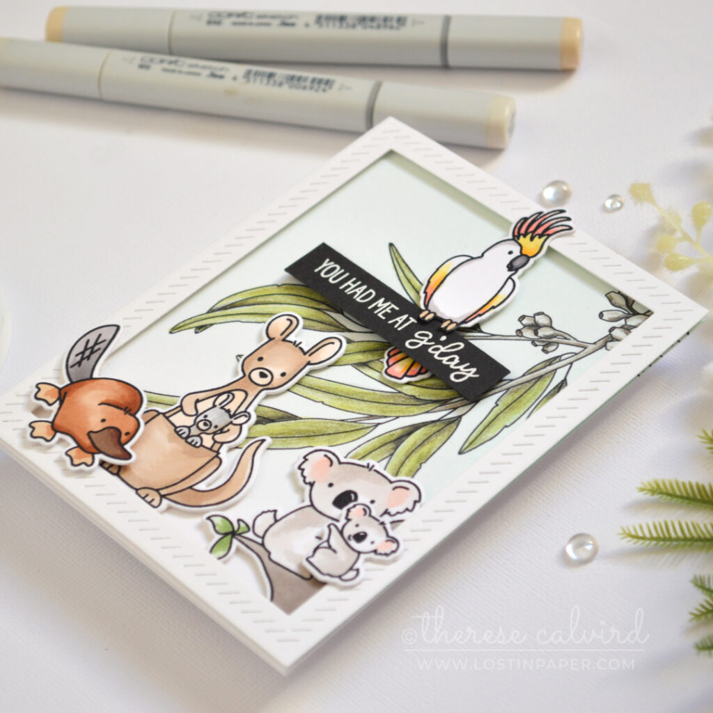 Handmade Australian welcome card featuring Copic colored Aussie critters, pencil colored gum leaves, and a G’day sentiment.