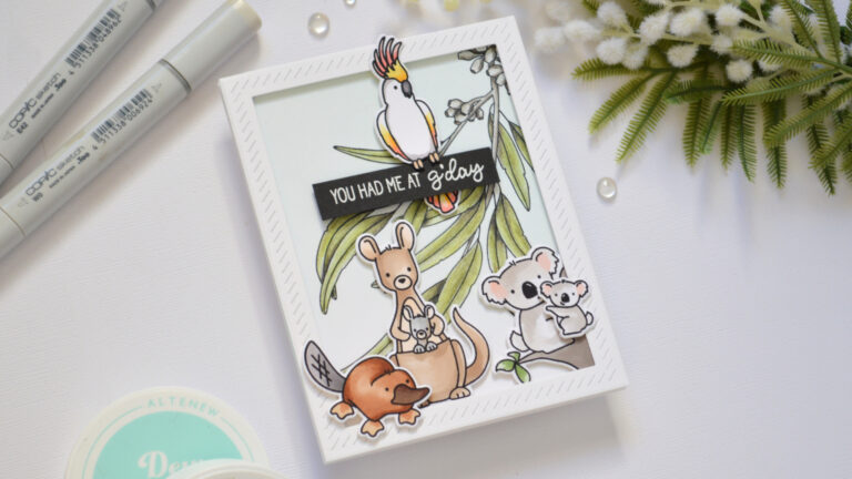 Handmade Australian welcome card featuring Copic colored Aussie critters, pencil colored gum leaves, and a G’day sentiment.