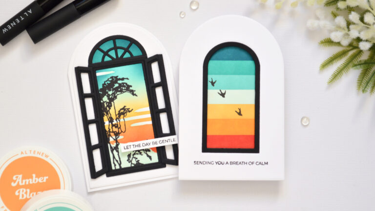 Two arched shaped cards with retro ink blended window scenes in teal, orange, and red.