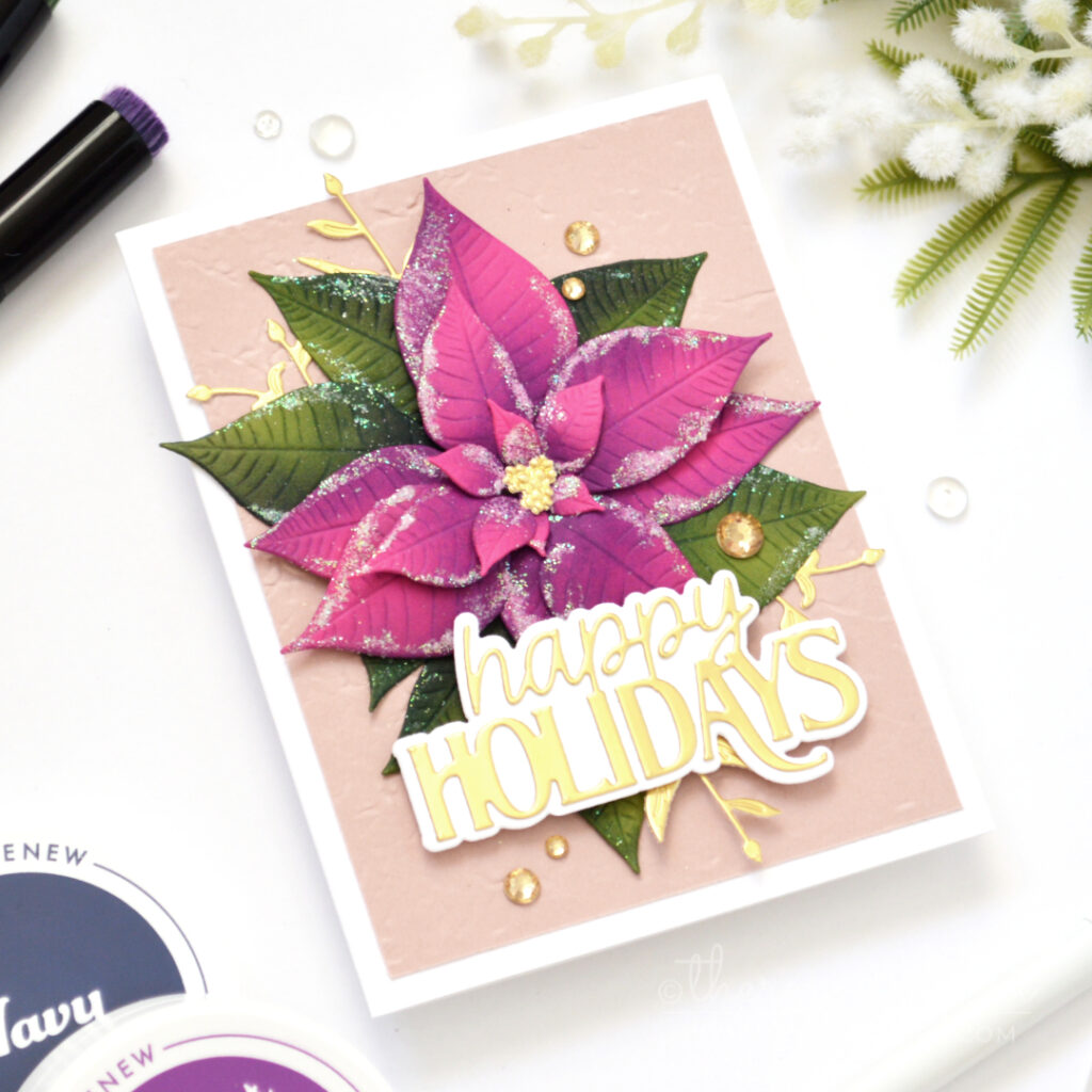 Handmade Christmas card featuring a layered embossed poinsettia with sugary sparkle and a reverse embossed background by Therese Calvird.